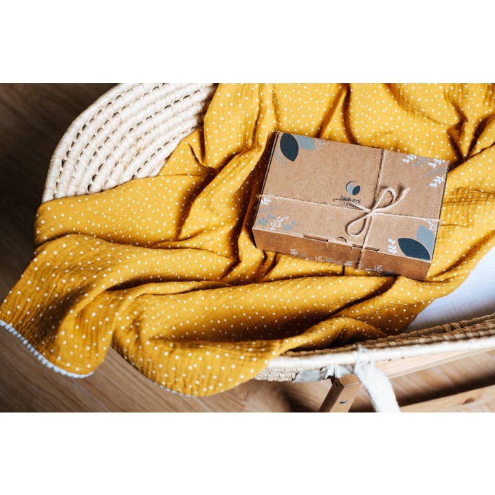 Manta pompón lunares ocre para venta al por mayor de Natural Cuddles