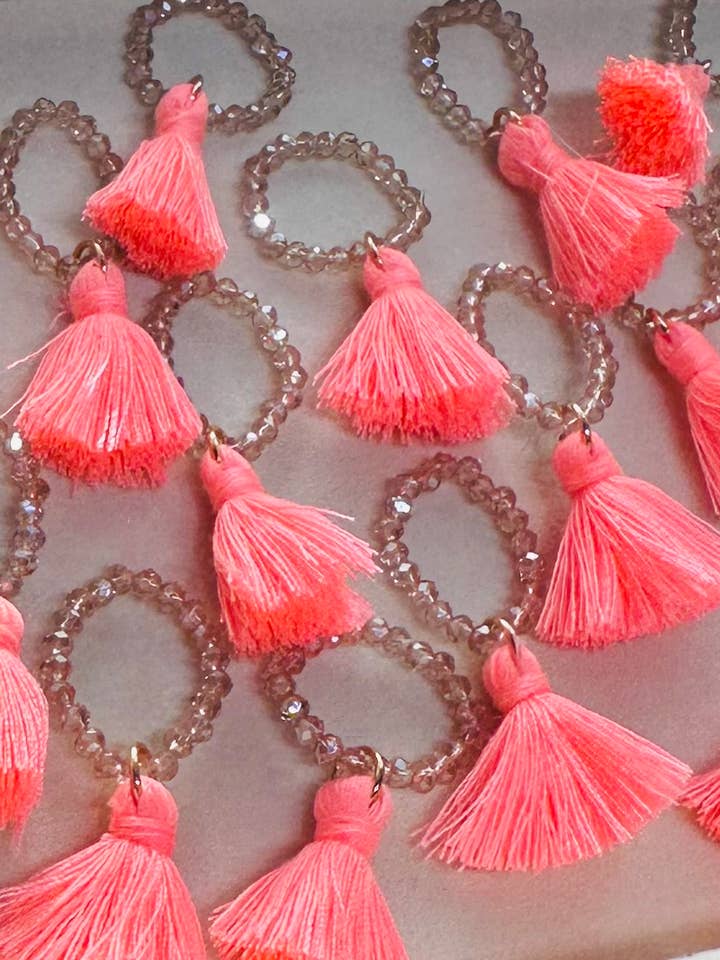 Salmon Tassel Stretch Charm for wholesale by Boots Are My Roots