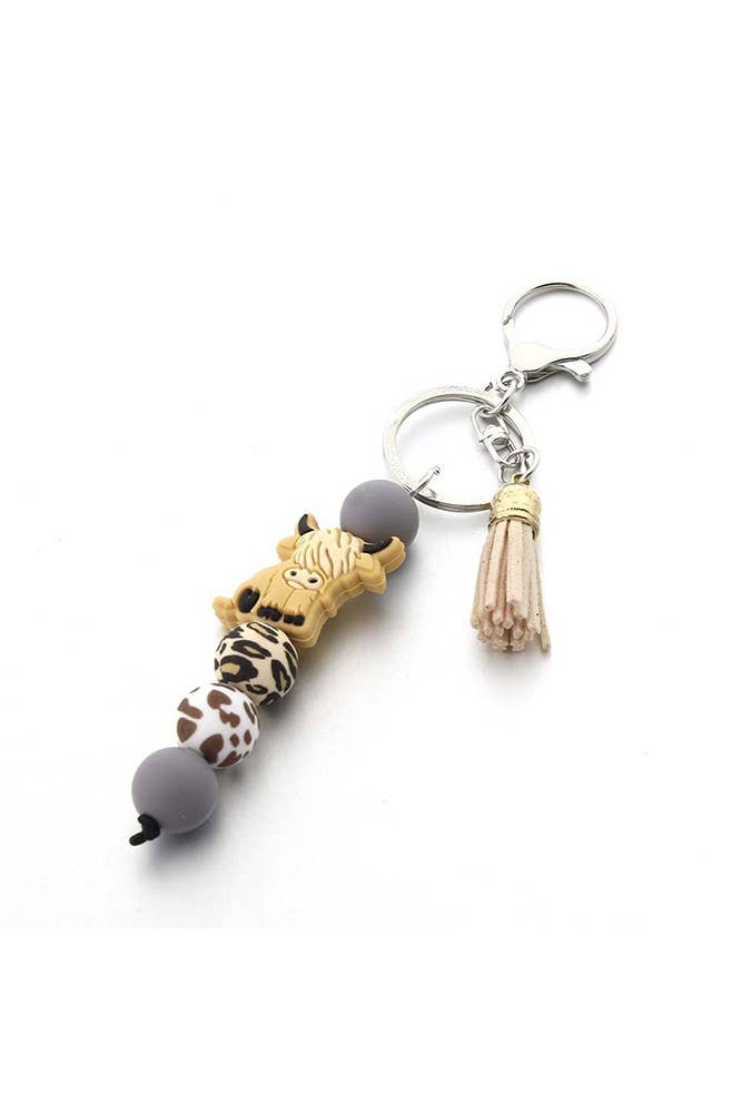 UNISHE – Engroshandel Nøglering - Dame – UNISHE nøglering med højlandskvigebeads og tilbehør ZK12610