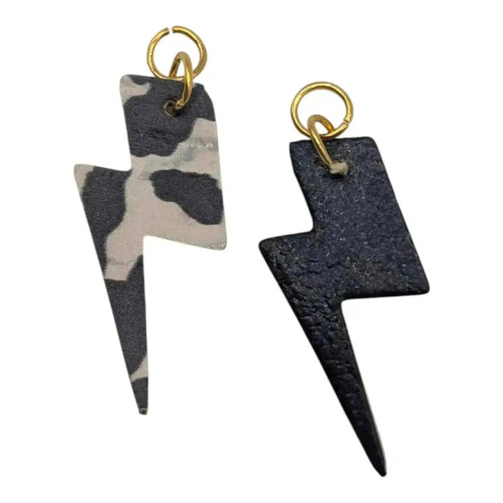 Cow print lightning bolt cork charms for wholesale by Trend Tonic Ltd