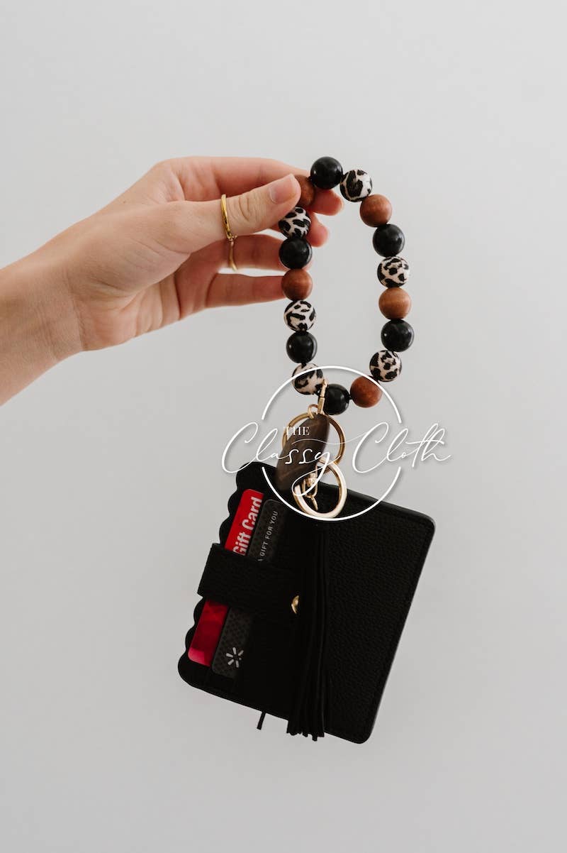 The Classy Cloth WS - Vente Bracelets - Portefeuille porte-clés MAMA Wristlet - Léopard avec pompon noir RTS1