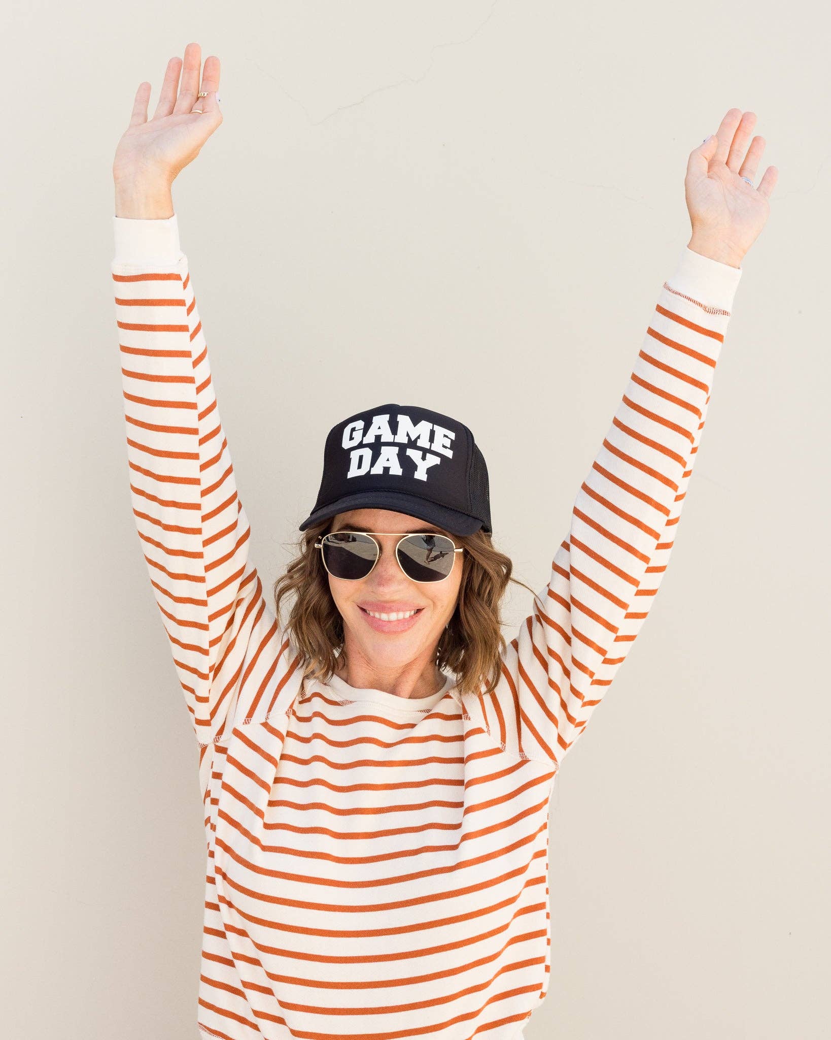 Game Day Trucker Hat in Black for wholesale on Faire2