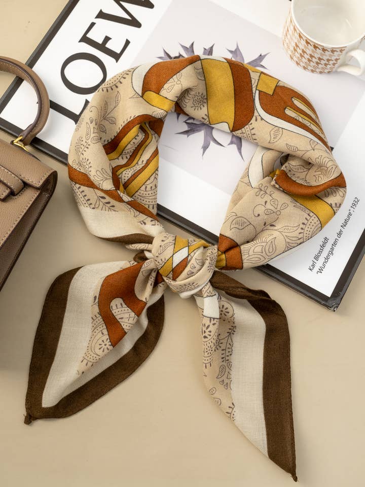 90x90 scarf with artistic patterns in elegant orange or beige for wholesale by COSMOS