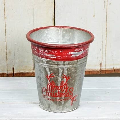 M11135- 6x7inH Distressed Tin Bucket-Holiday-0/24 for wholesale by Impressive Enterprises, Inc.
