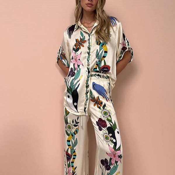 Ensemble deux pièces de t-shirt à manches longues et boutonnées, poches à imprimé floral, haut et bas de pantalon élastique avec cordon de serrage pour la vente par UZ Wholesale Store