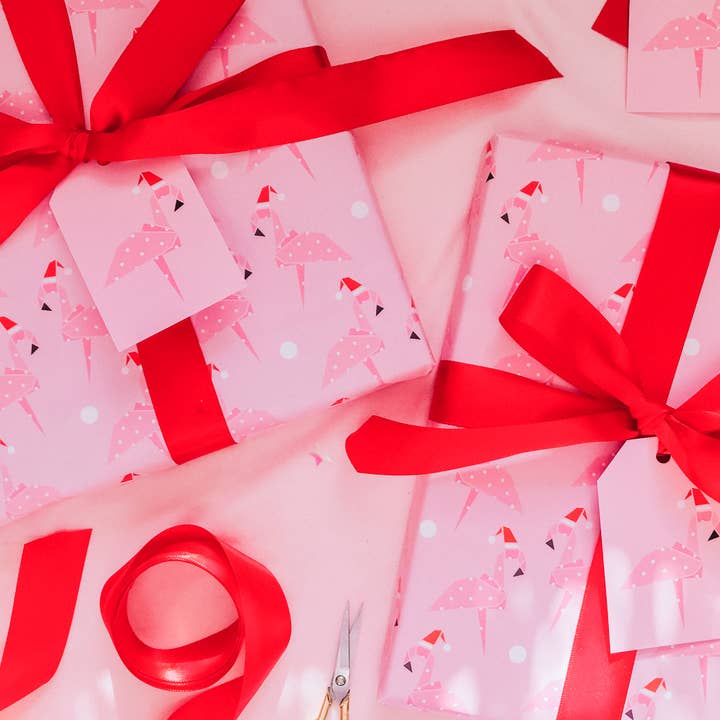 Christmas Pink Origami Flamingo Wrapping Paper for wholesale by Dottie's Paper Co.