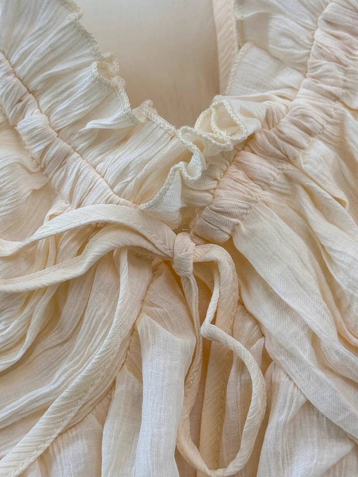 beige BOHO Beach Resort ruffle halter large swing flare maxi dress for wholesale on Faire13