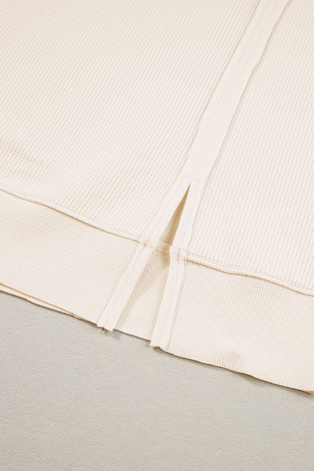 White Waffle Knit Bishop Sleeve Split Oversized Sweatshirt for wholesale on Faire5