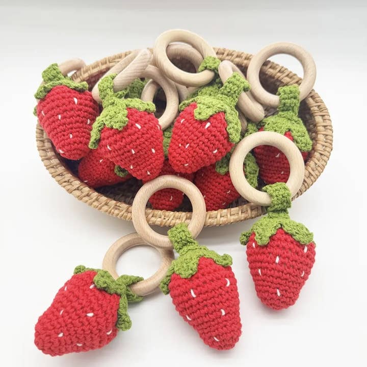 Handmade Crocheted Rattle with Beech Wood Ring – Strawberry for wholesale by Rammelaartje