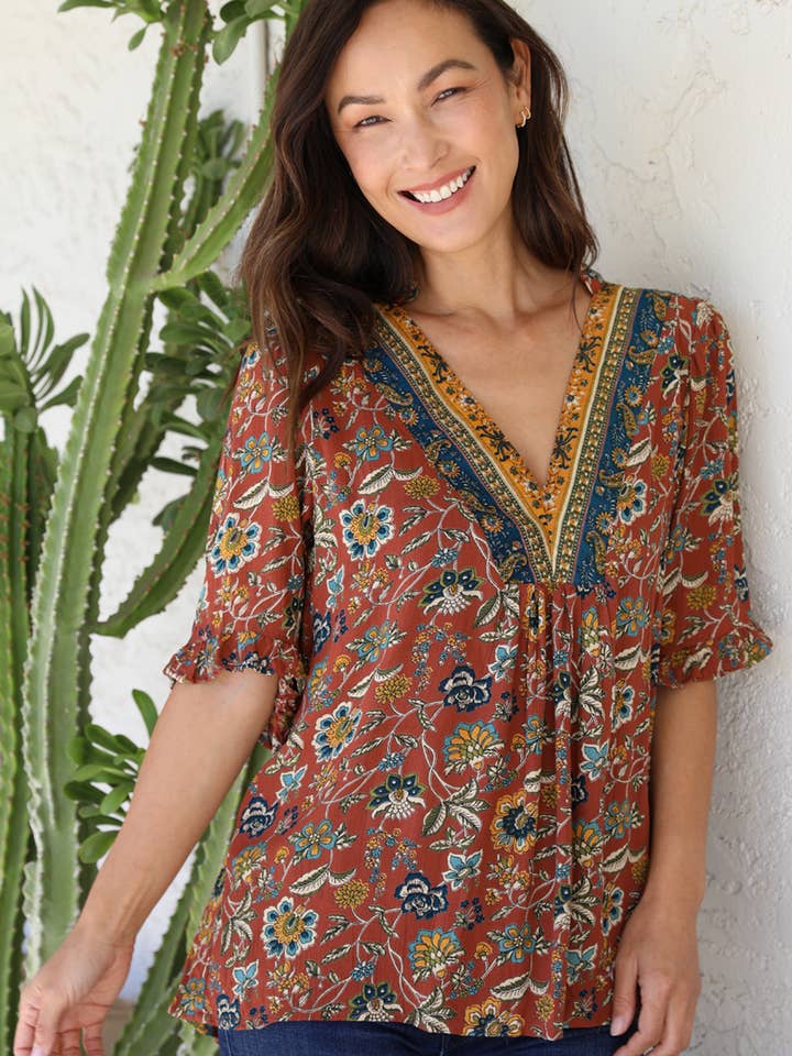 E2V48-FQ75 SPLIT NECK HALF SLV BLOUSE for wholesale by Nostalgia