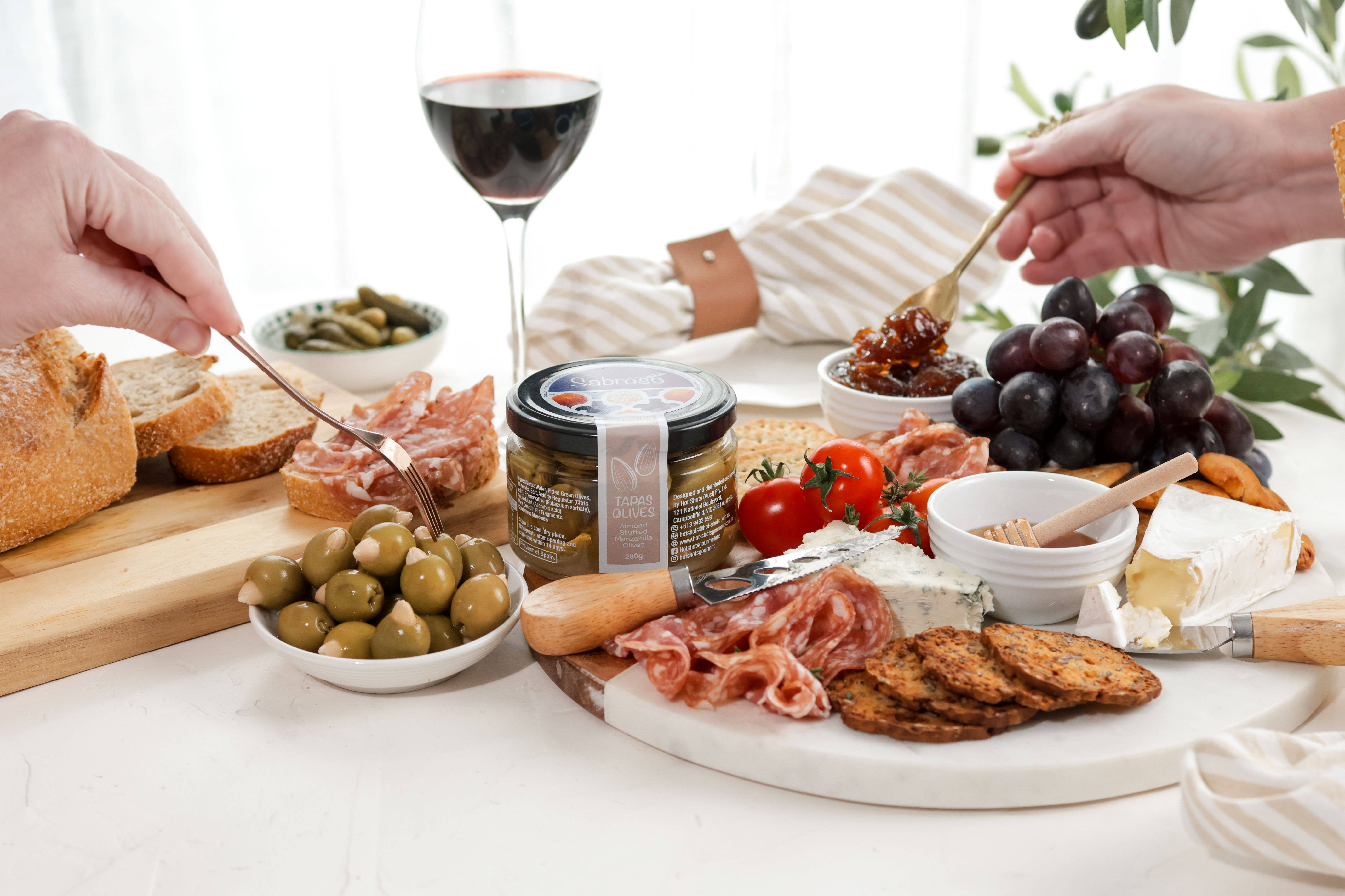 Grill Society - Wholesale Olives - Sabroso Almond Stuffed Manzanilla Olives1