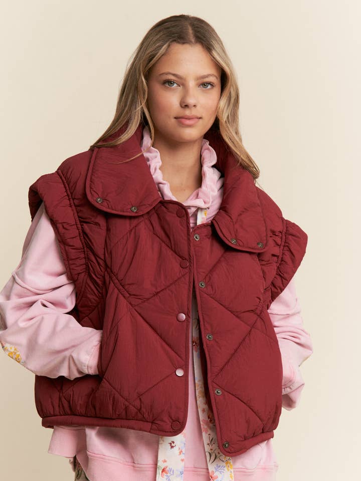 Gilet matelassé à motif losange pour la vente par J.NNA