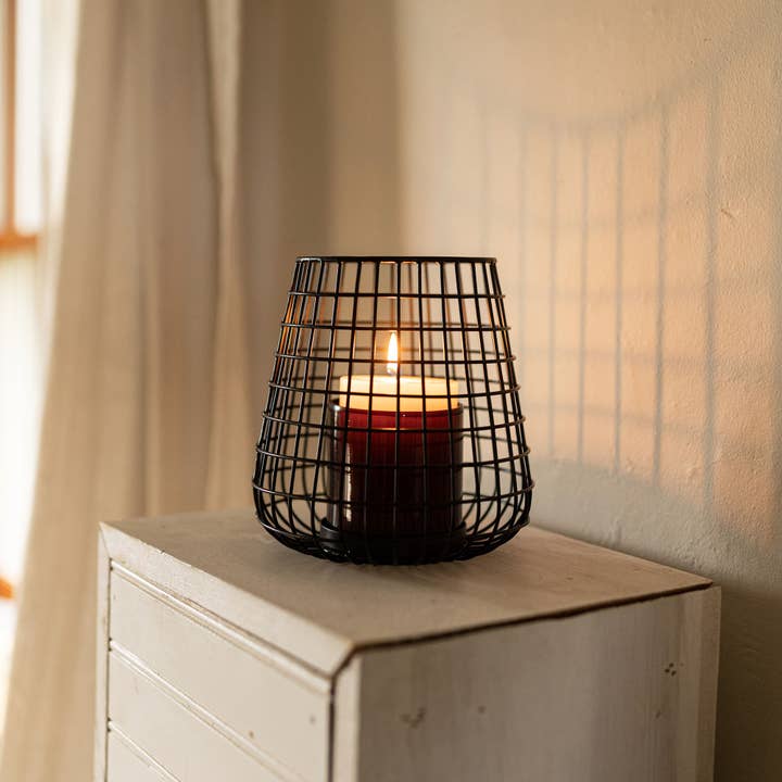 Foreside Home & Garden - Wholesale Candle Holder - Orson Black Wire Base Amber Glass Pillar Holder Fall Decor