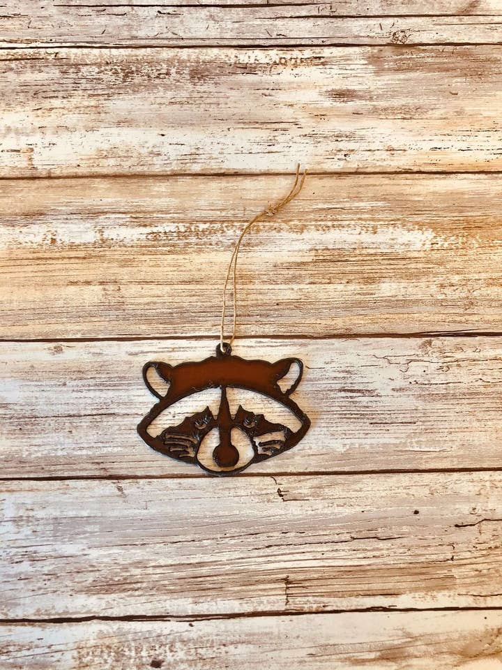 Raccoon Face Lodge Ornament for wholesale by Universal Ironworks USA