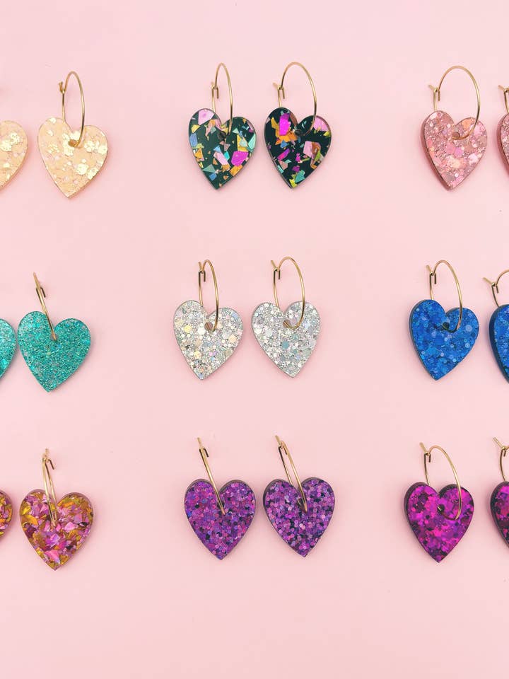 Creoles with glittery heart charms for wholesale by Studio Annette