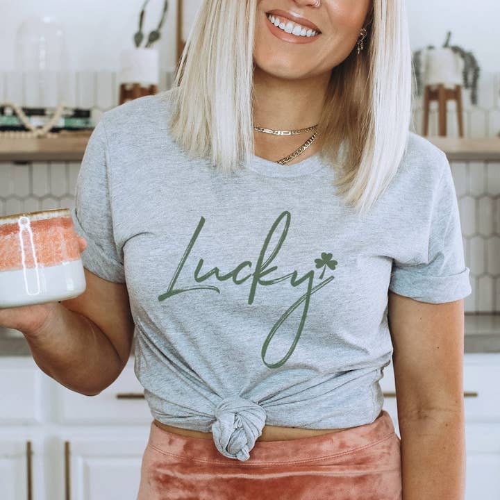 Lucky Script Tee – Minimal St. Patrick’s Day Clover Graphic T-Shirt – HO119 for wholesale by Rockledge Designs