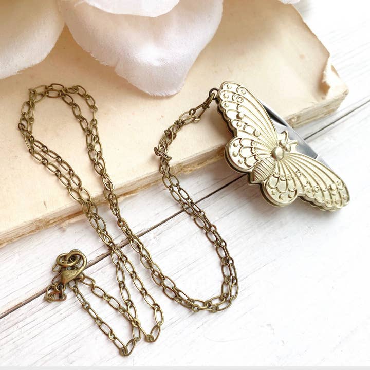 Butterfly Necklace Folding Pocket Knife Novelty Pendant 26" and other Purchase Wholesale butterfly pendant. Free Returns & Net 60 Terms on Faire trending on Faire.