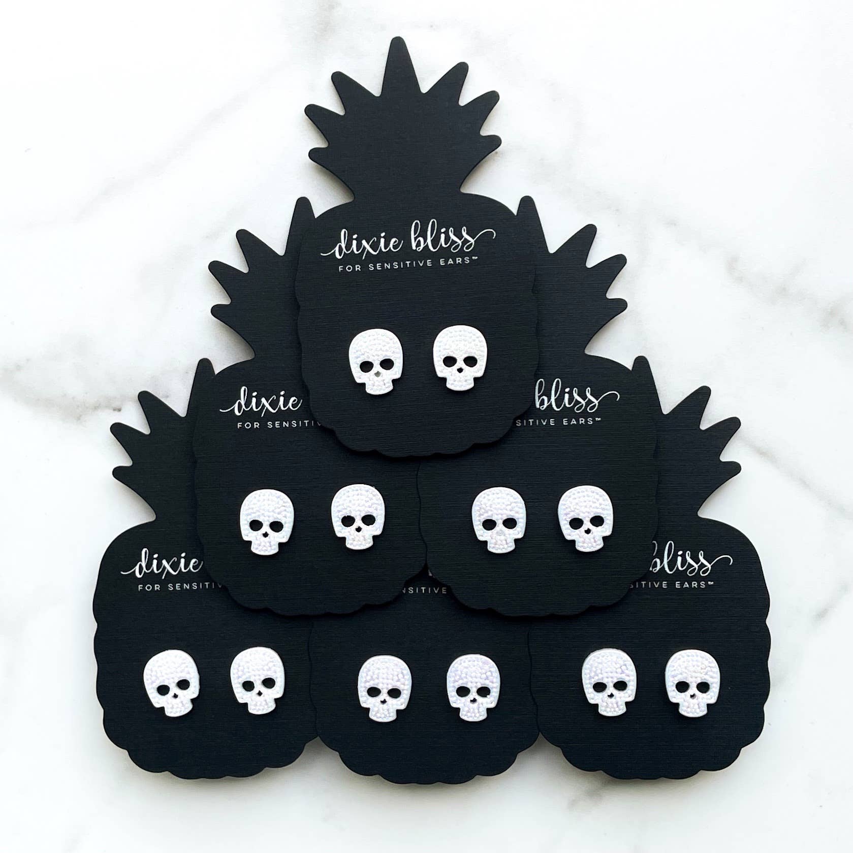 Dixie Bliss - Wholesale Stud/Post Earrings - Studded Skulls in White1