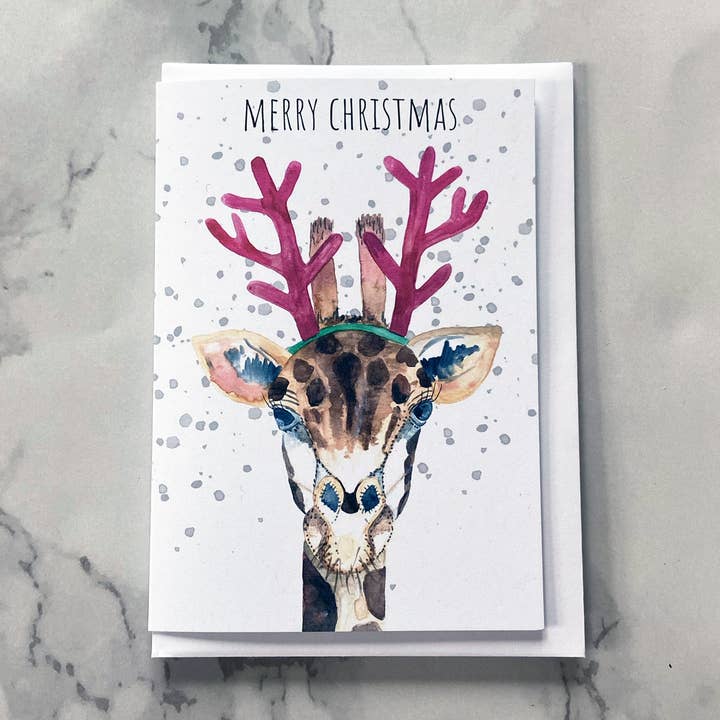 Cartão de Natal com girafa de chifres de rena por atacado de Pippa & Paper