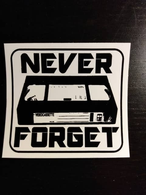 Sticker - Never Forget (VHS) for wholesale by GOBLINHAUS