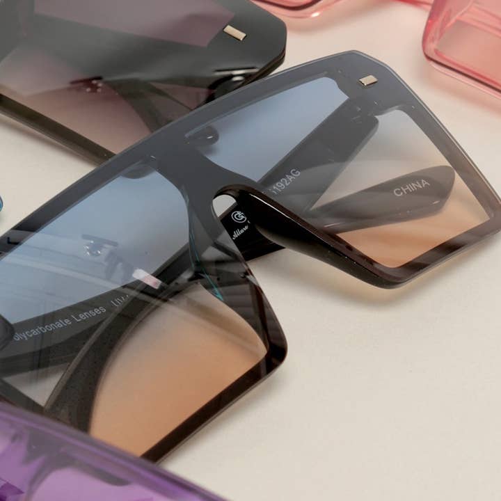 ASSORTED COLOR Unisex Transparent Flat Top Shield Sunglasses for wholesale on Faire