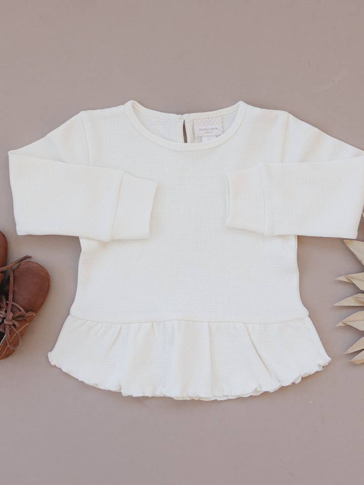 Long Sleeve Peplum | Ivory for wholesale by Henry Drew Collection