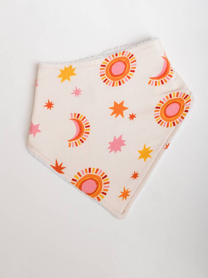 Sol og måne hagesmæk for engroshandel hos Pax & Lucy