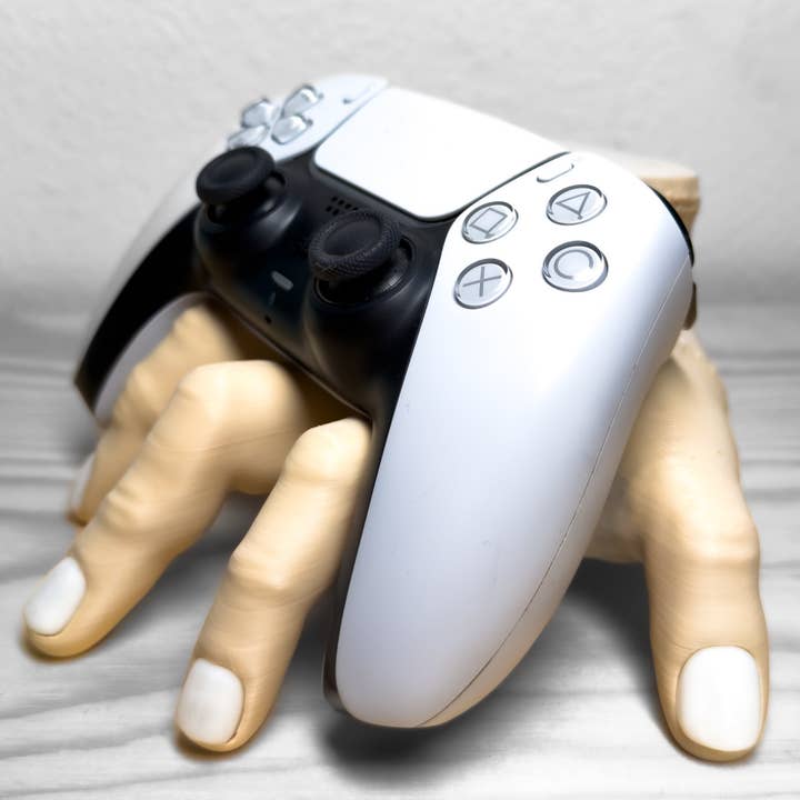 August Art House - Wholesale Phone/tablet stand - Wednesday Addams Family Thing Hand Controller Stand | Creepy Gaming Display Holder1