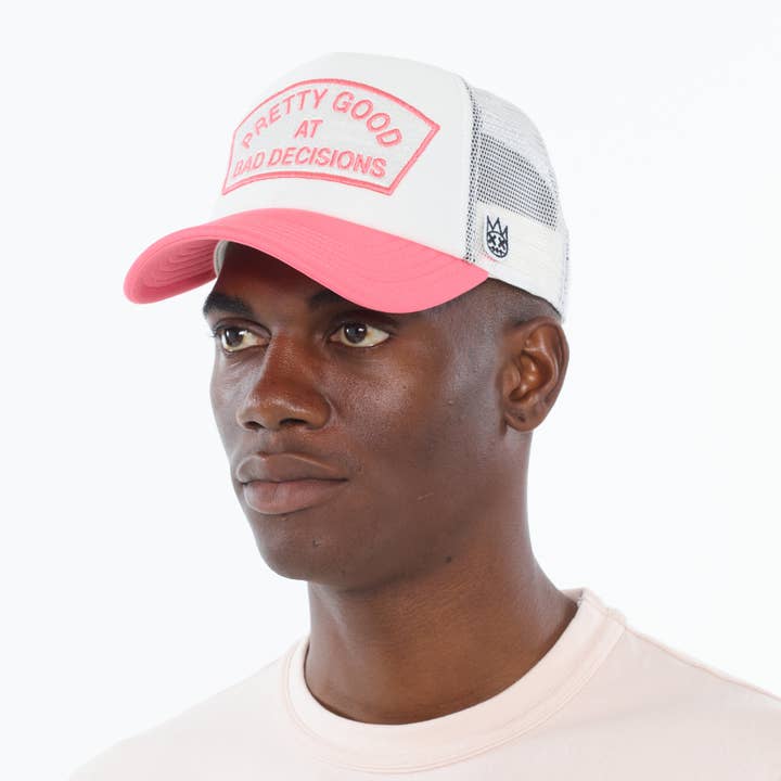 "Good At Bad Decisions" Mesh Back Trucker Hat in White for wholesale on Faire