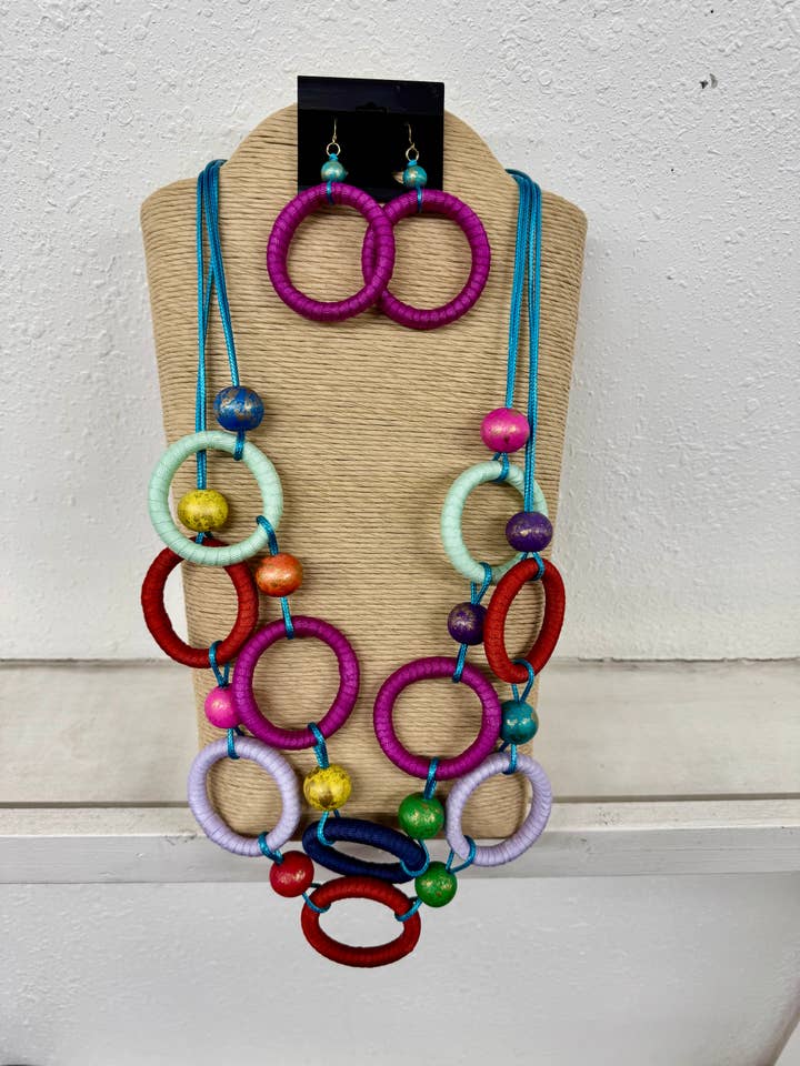 4 STRANDS TURQUOISE WAX CORD WITH MULTI COLOR ROUND RINGS WI for wholesale by International Duru's