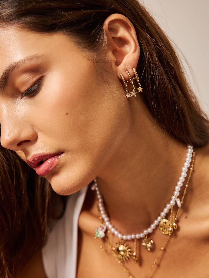 Multi Hoop Star Earrings in Stainless Steel and other Purchase Wholesale star. Free Returns & Net 60 Terms on Faire trending on Faire.