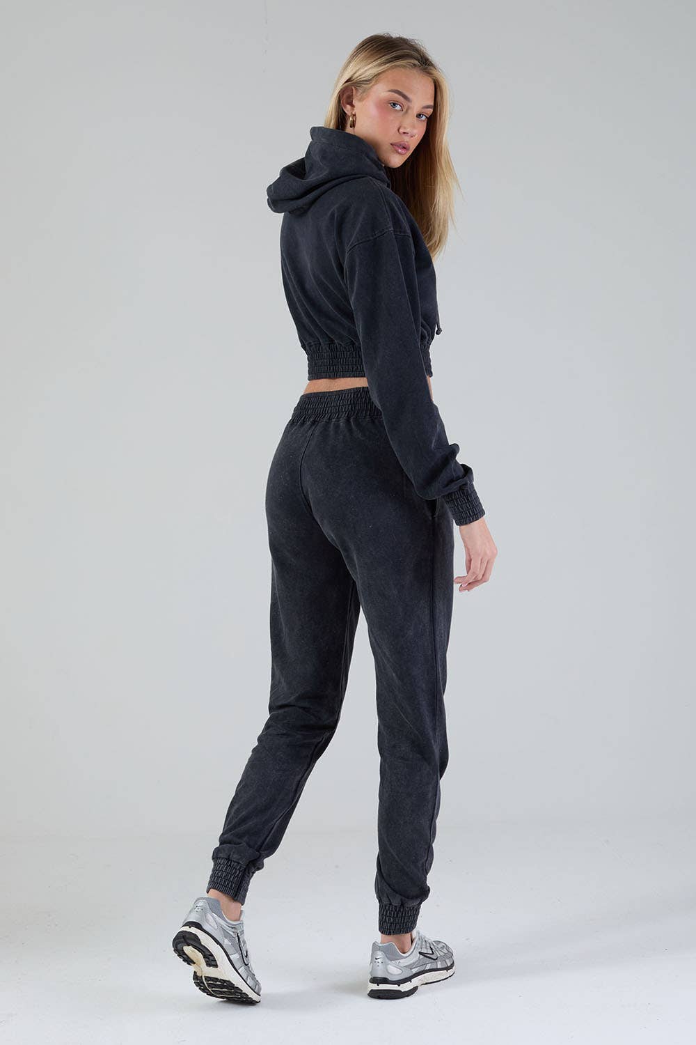 The Stratus Tracksuit in Charcoal for wholesale on Faire4