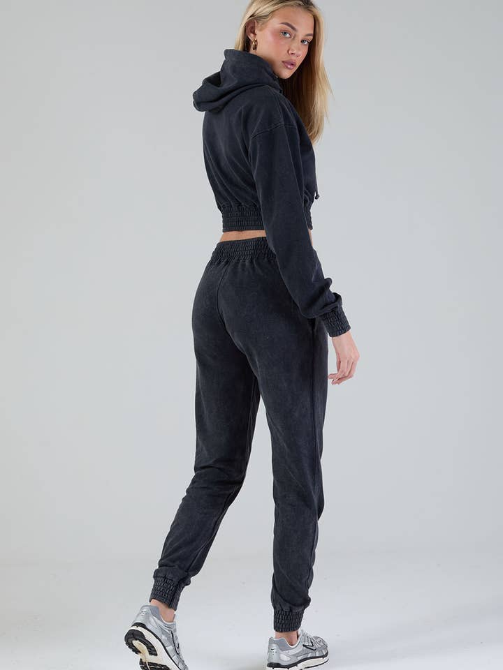 The Stratus Tracksuit in Charcoal for wholesale on Faire4