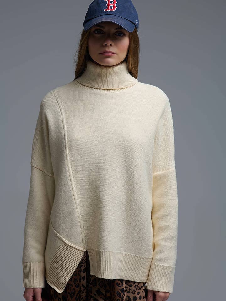 Soft knitted Asymmetric Turtleneck Sweater in beige for wholesale by Q2—All Orders:Free Duties for the US,UK,and Canada