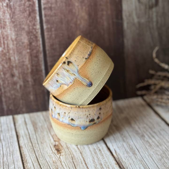 Mini hug mug in soft orange with brown spots and other Purchase Wholesale clay mugs. Free Returns & Net 60 Terms on Faire trending on Faire.