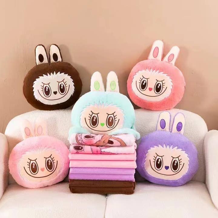 Ensemble de 2 pièces : coussin monstre mignon et couverture. pour la vente par Little Trendy