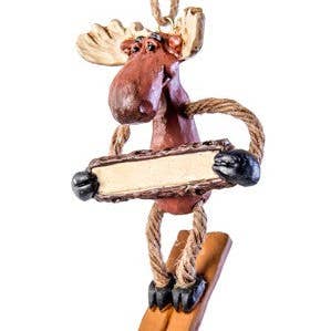 Bac 144 Skiing Moose with Sign Ornament for wholesale by J Devlin Glass Art & Bert Anderson Collection