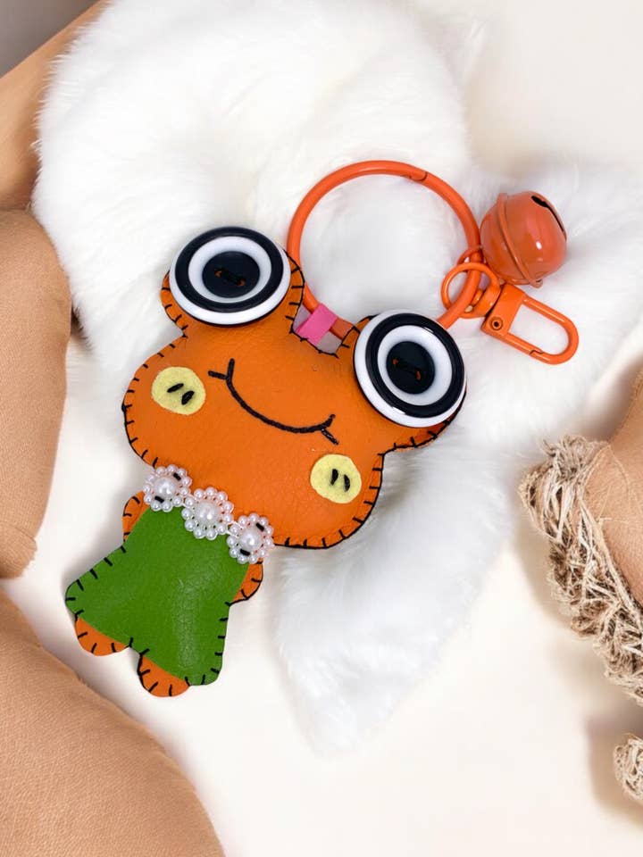 Portachiavi in peluche con campanellino JSG63 per la vendita all'ingrosso da parte di BYREN | ÉLINE L'ATELIER