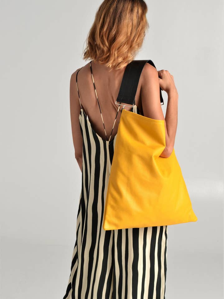 Akathi leather bag in yellow for wholesale by ANA KOUTSI