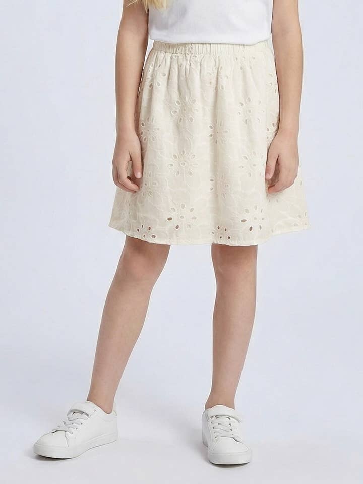 Jupe en coton à broderie anglaise pour fille pour la vente par MINI MIGNON PARIS