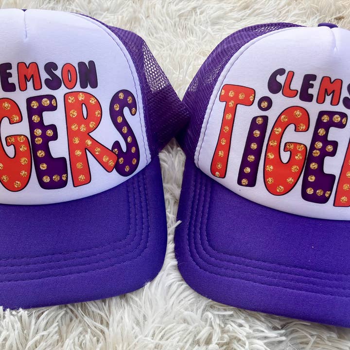 Clemson Tiger inspired trucker hat and other Purchase Wholesale clemson tigers. Free Returns & Net 60 Terms on Faire trending on Faire.