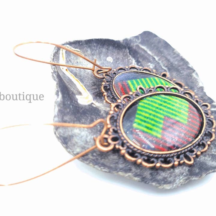 Oval kente copper drop earrings sealed in resin for wholesale by Akrasiboutique