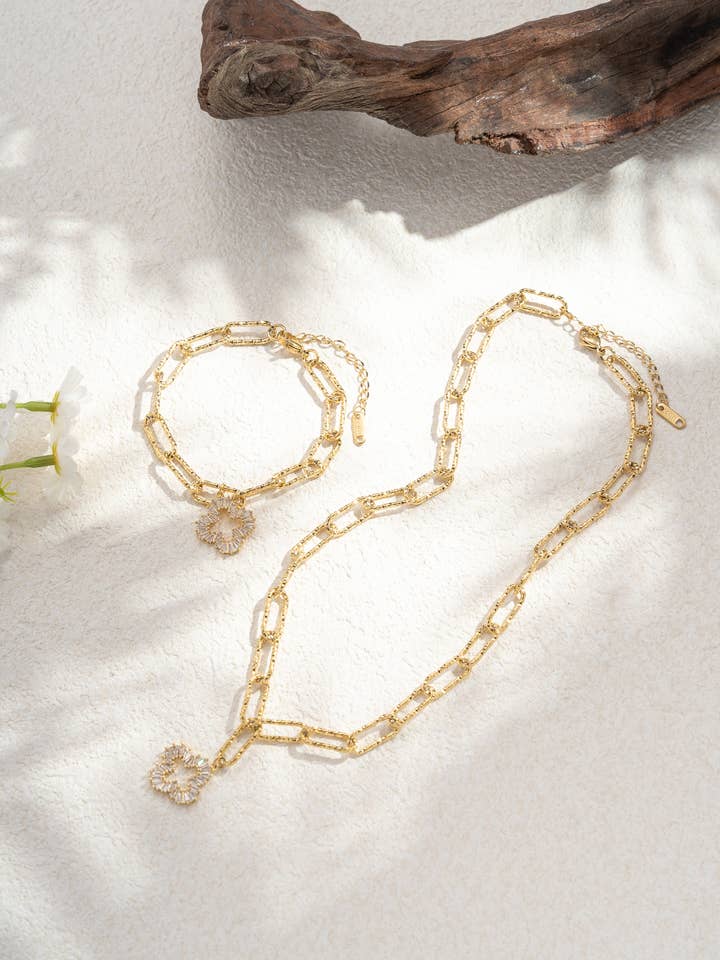 Radiant square charm link necklace and bracelet set in steel for wholesale by COSMOS