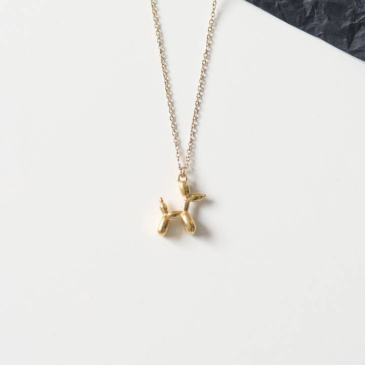 Melange Blanc - Wholesale Pendant/Charm Necklace - Camilie Balloon Puppy Dog Charm Necklace in gold & silver