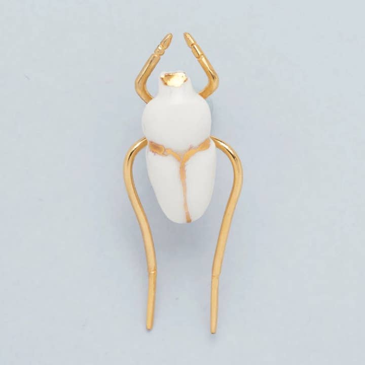 Broche sagrado por atacado de JORDANE SOMVILLE