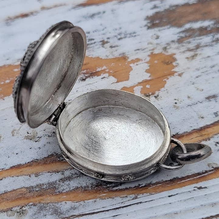 Silver Insanity – wholesale Individual charm/pendant – Oval Blue Topaz Sterling Silver Poison Box Locket Pendant