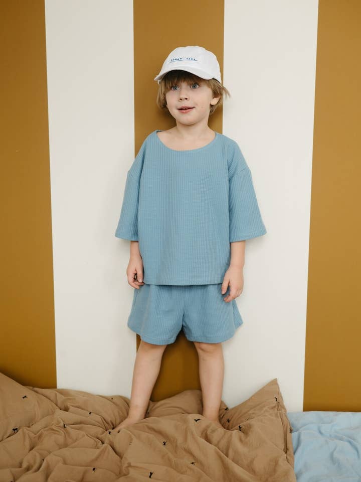 Wide blue waffle shorts for wholesale by millawkids