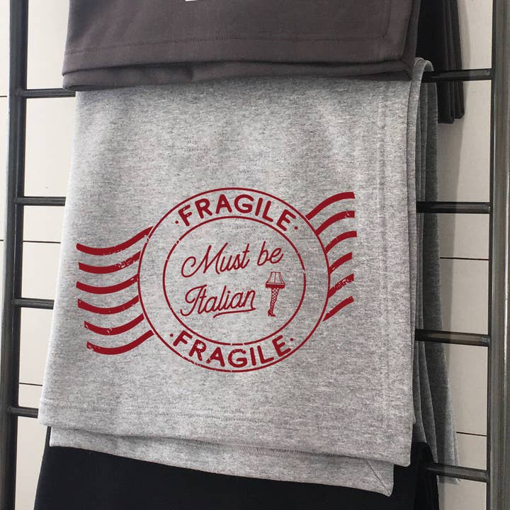 Fragile Christmas Story Sweatshirt Blanket for wholesale by Perfect Day Print Co