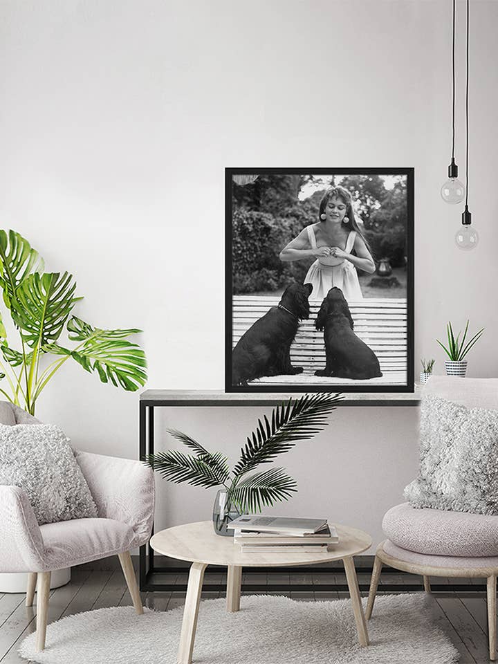 Image de Brigitte avec ses chiens. Impression murale avec cadre. pour la vente par Any Image