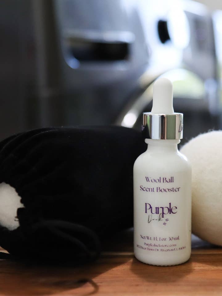 Wool Dryer Balls and 1 oz. Scent Booster for wholesale by Purple Duck